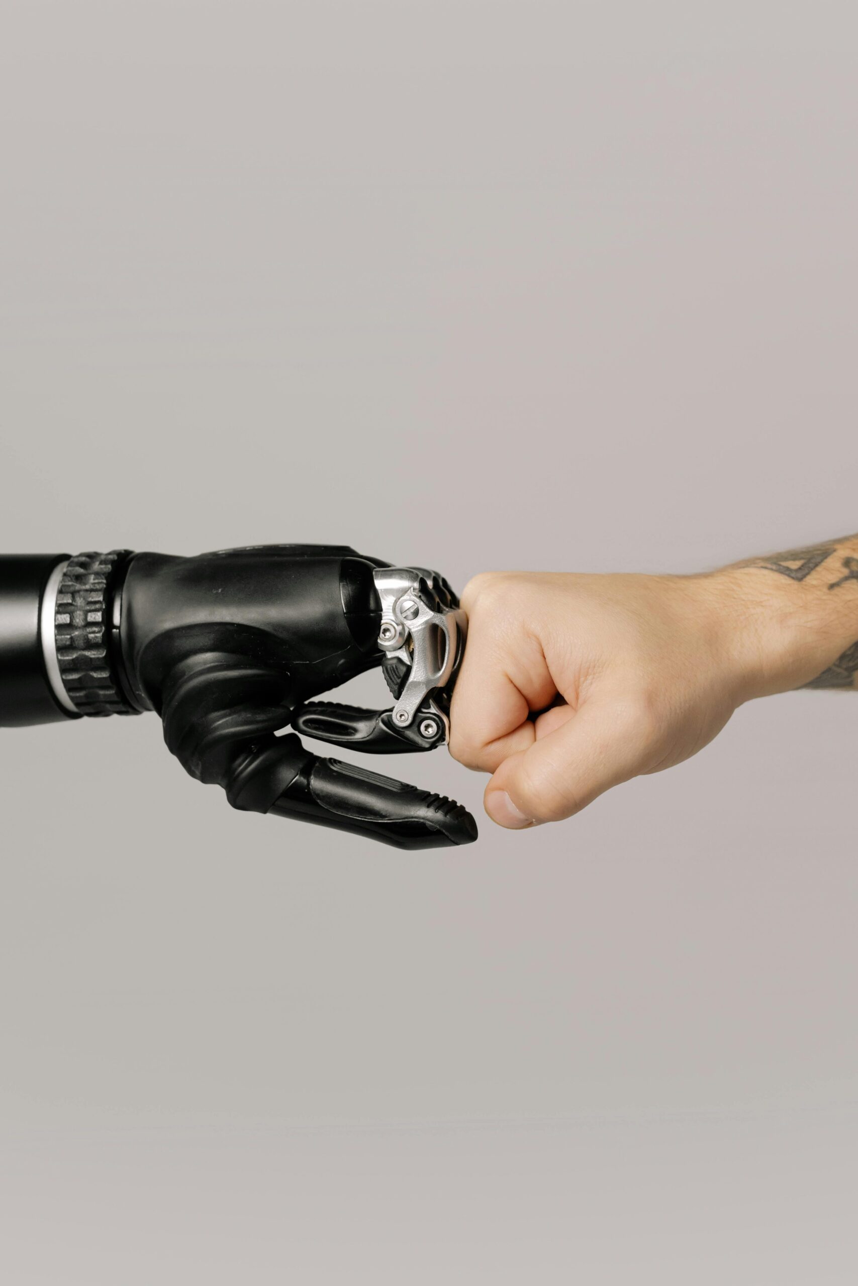 Photo by cottonbro studio: https://www.pexels.com/photo/close-up-shot-of-fist-bump-6153344/